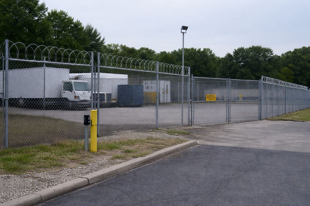 an ai photo of security fencing for a commercial property in Kansas City