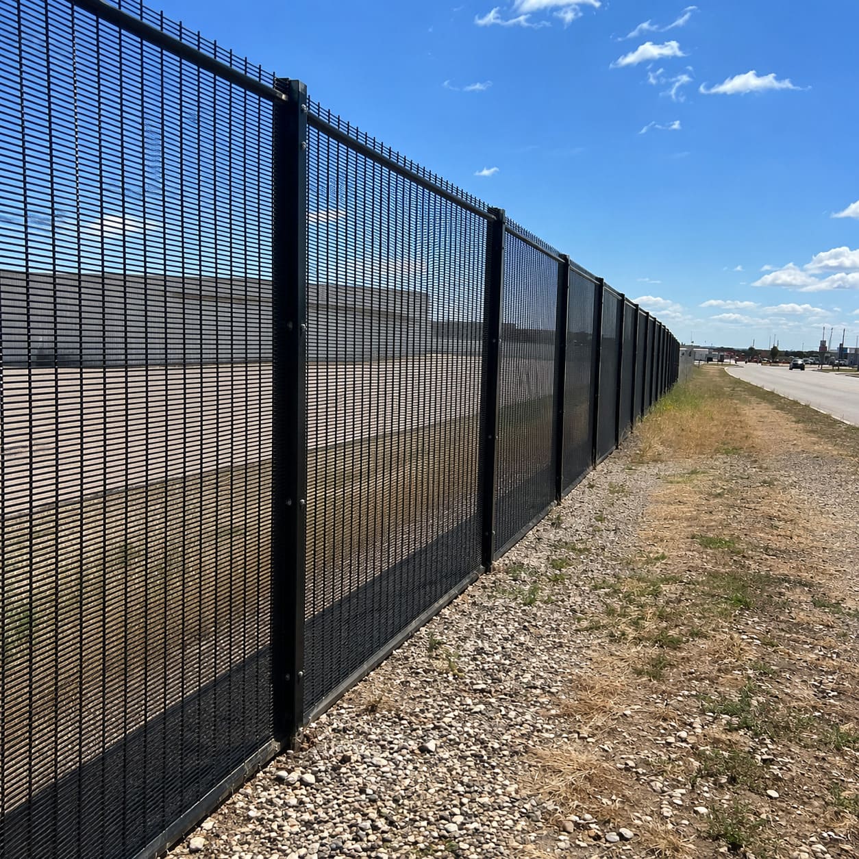 Security Fence – Tall black welded mesh security fence for high-security perimeter - Sample Image